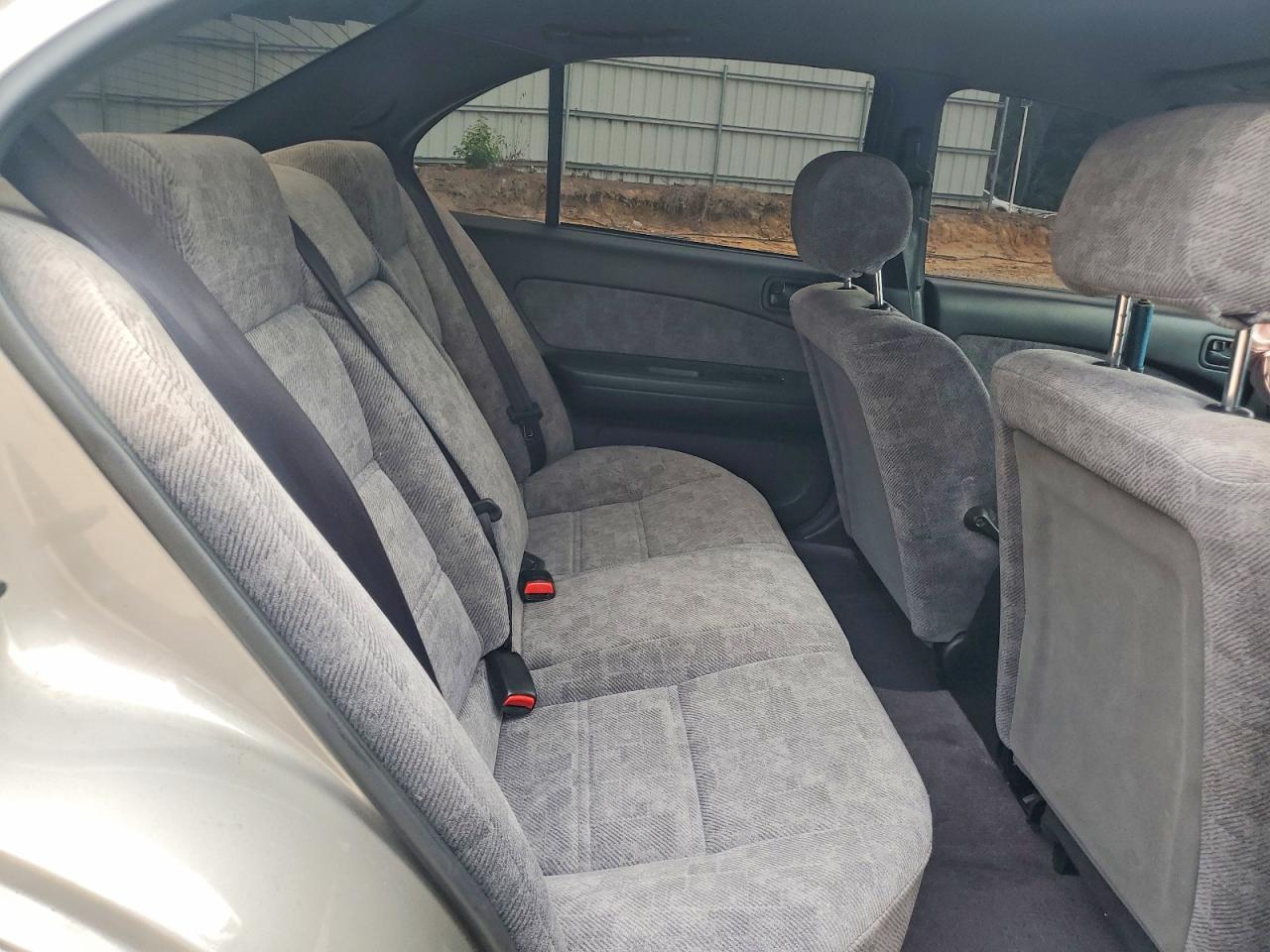 1999 Nissan Maxima Gxe Tan vin: JN1CA21D1XT202798