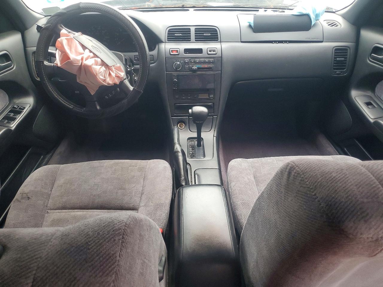1999 Nissan Maxima Gxe Tan vin: JN1CA21D1XT202798