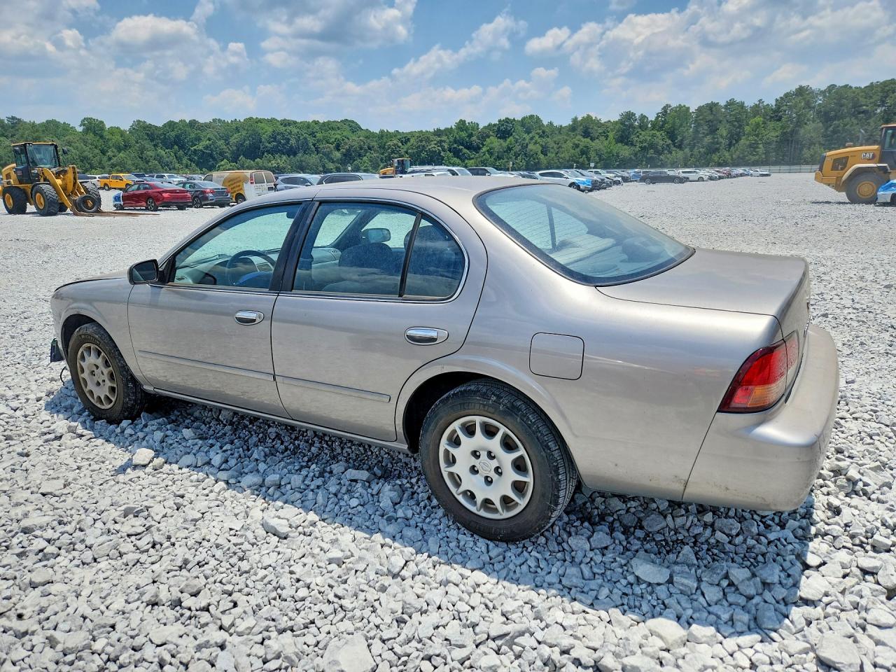 1998 Nissan Maxima Gxe Tan vin: JN1CA21D4WT522681
