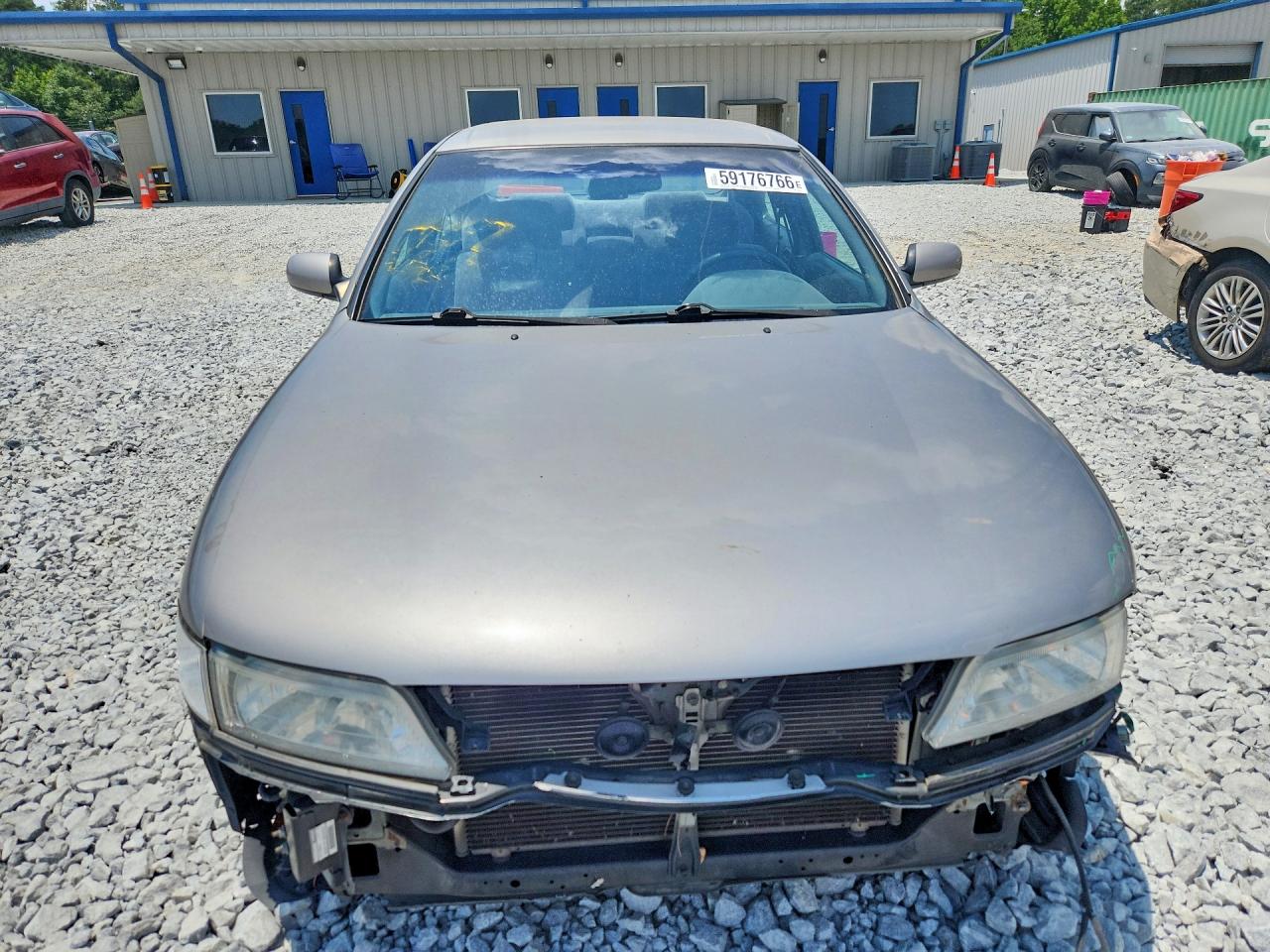 1998 Nissan Maxima Gxe Tan vin: JN1CA21D4WT522681