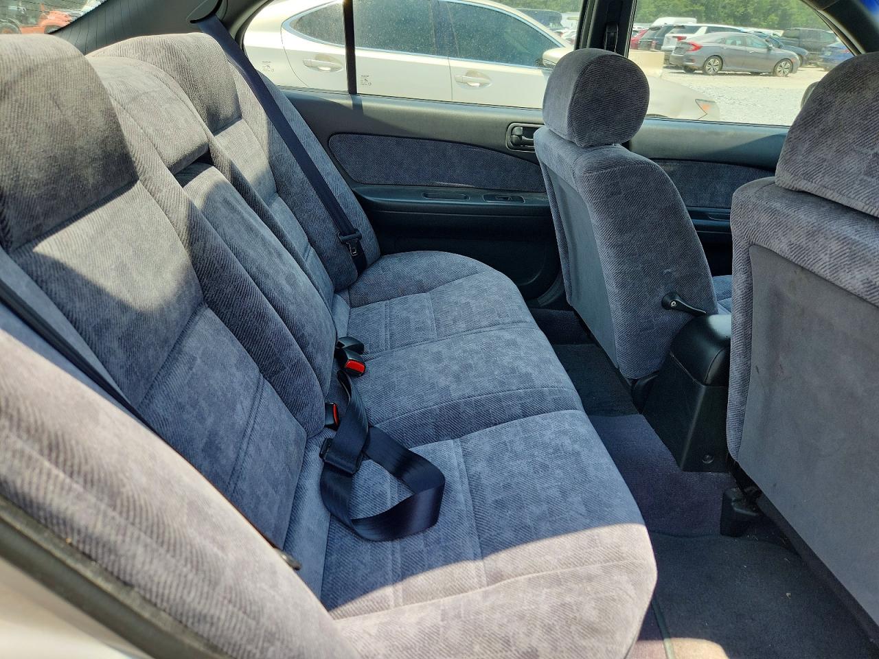 1998 Nissan Maxima Gxe Tan vin: JN1CA21D4WT522681