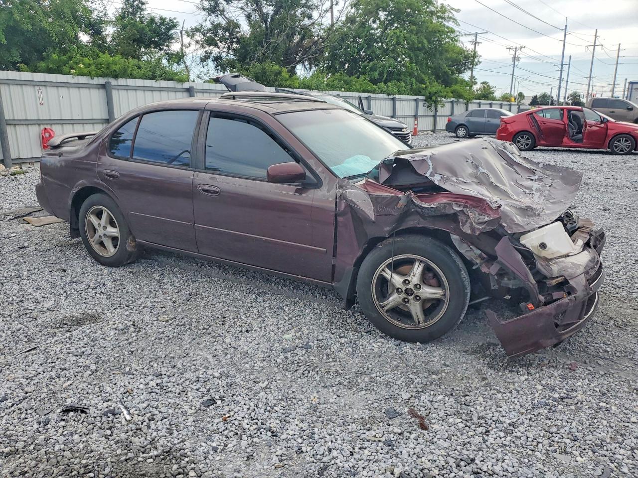 1997 Nissan Maxima Gxe Maroon vin: JN1CA21D6VT877785