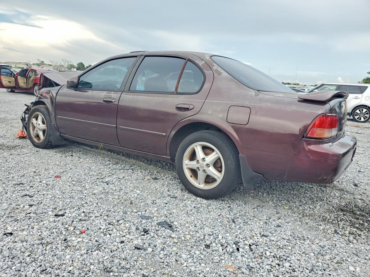 1997 Nissan Maxima Gxe Maroon vin: JN1CA21D6VT877785