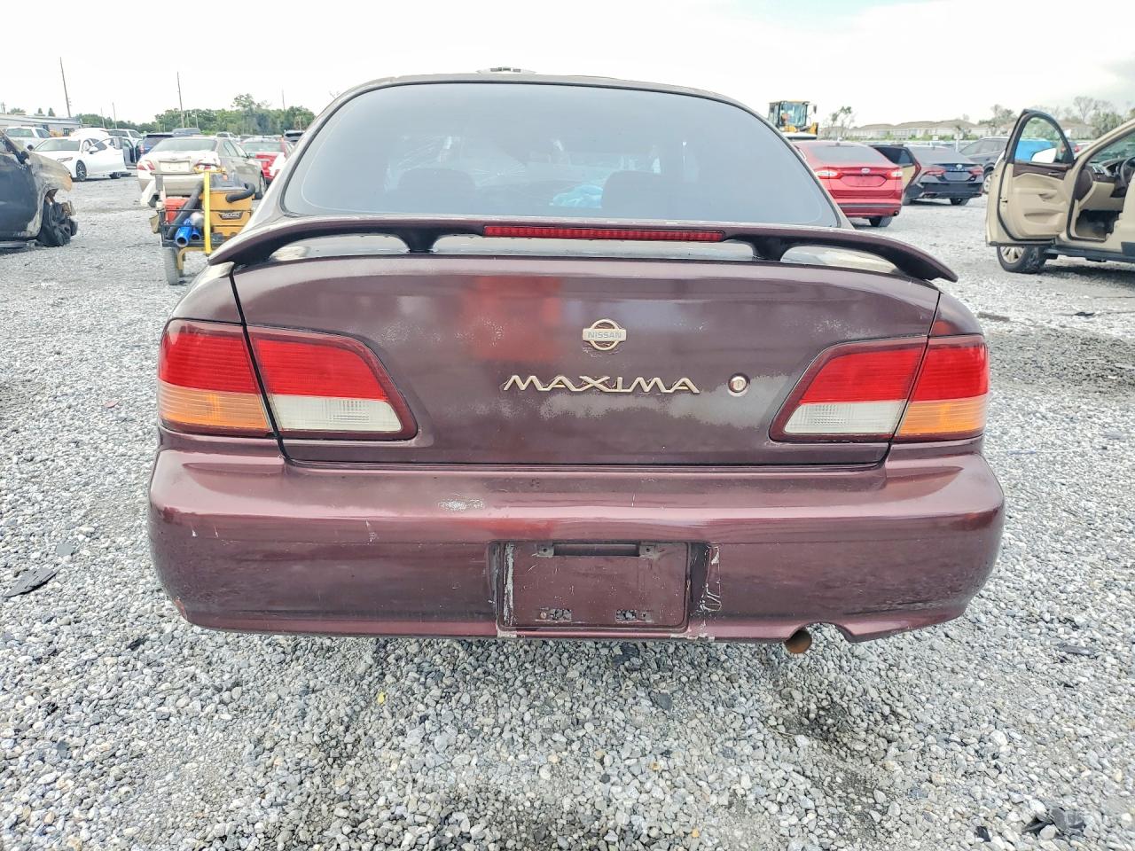 1997 Nissan Maxima Gxe Maroon vin: JN1CA21D6VT877785