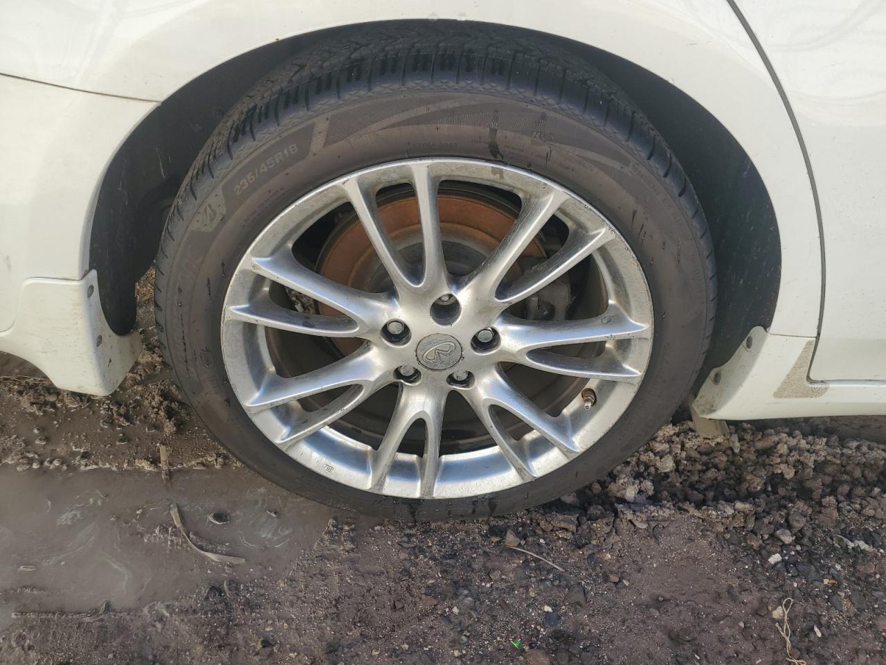 2013 Infiniti G35 White vin: JN1CV6AP7DM722189 Damage: Right Rear Wheel, Curb Rash, > 12 Inches