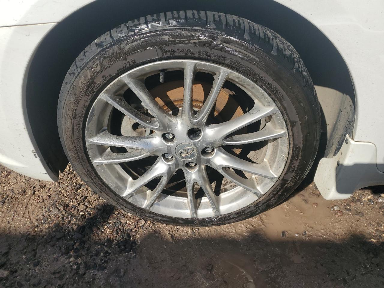 2013 Infiniti G35 White vin: JN1CV6AP7DM722189 Damage: Left Front Wheel, Curb Rash, > 12 Inches