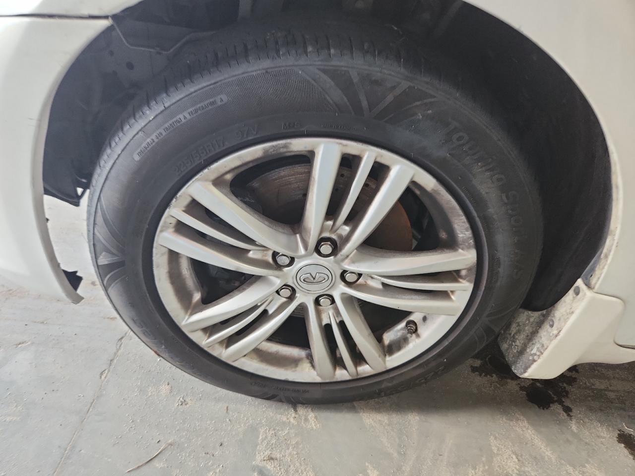 2015 Infiniti Q40 White vin: JN1CV6AR9FM524685 Damage: Left Front Wheel, Curb Rash, 4 To 5 Inches