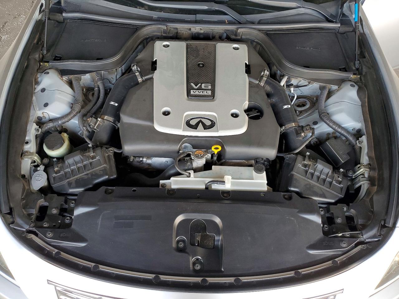 2014 Infiniti Q60 Convertible Base Silver vin: JN1CV6FE9EM902105
