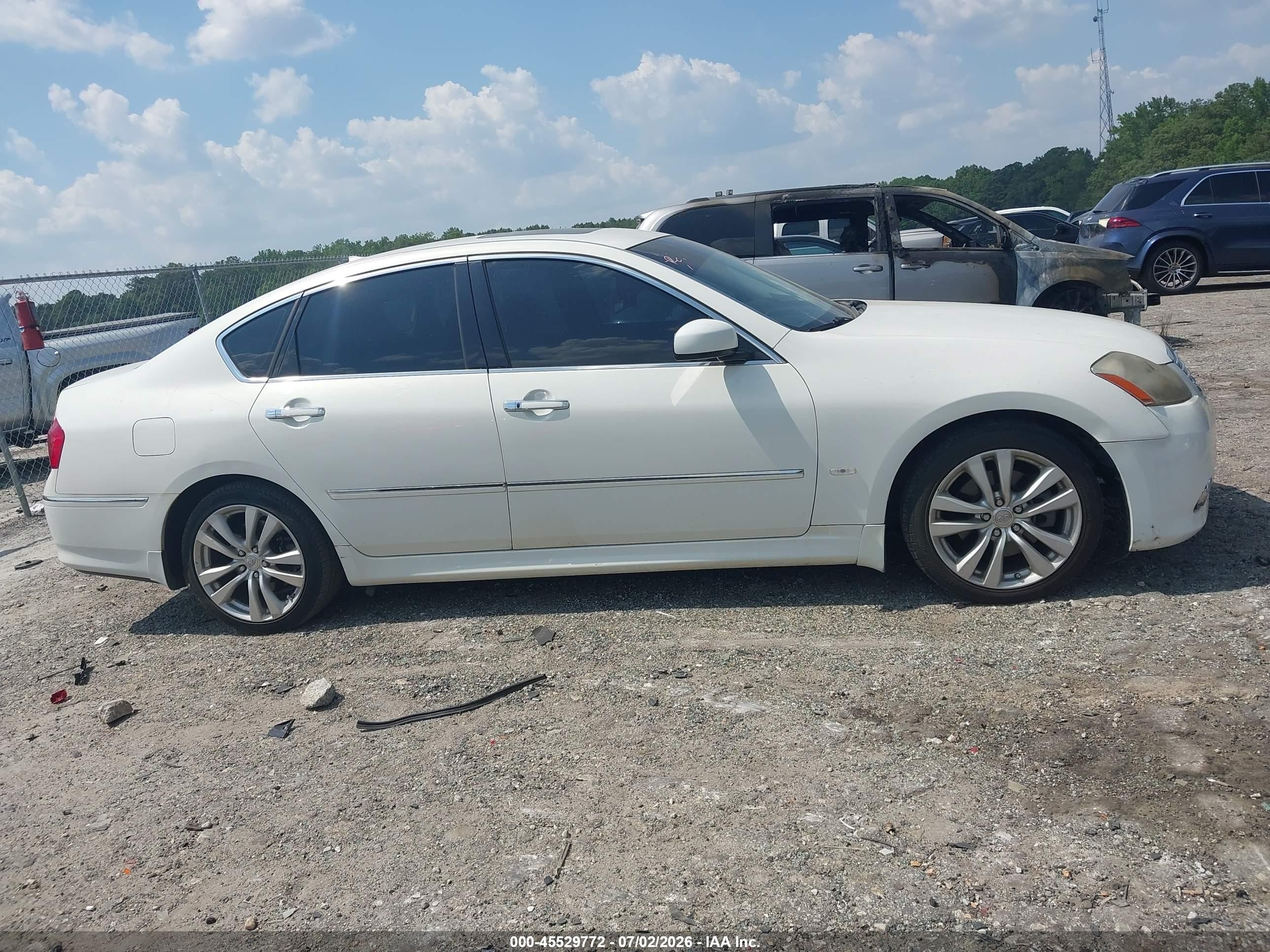 2010 Infiniti M35   White vin: JN1CY0AP9AM911751