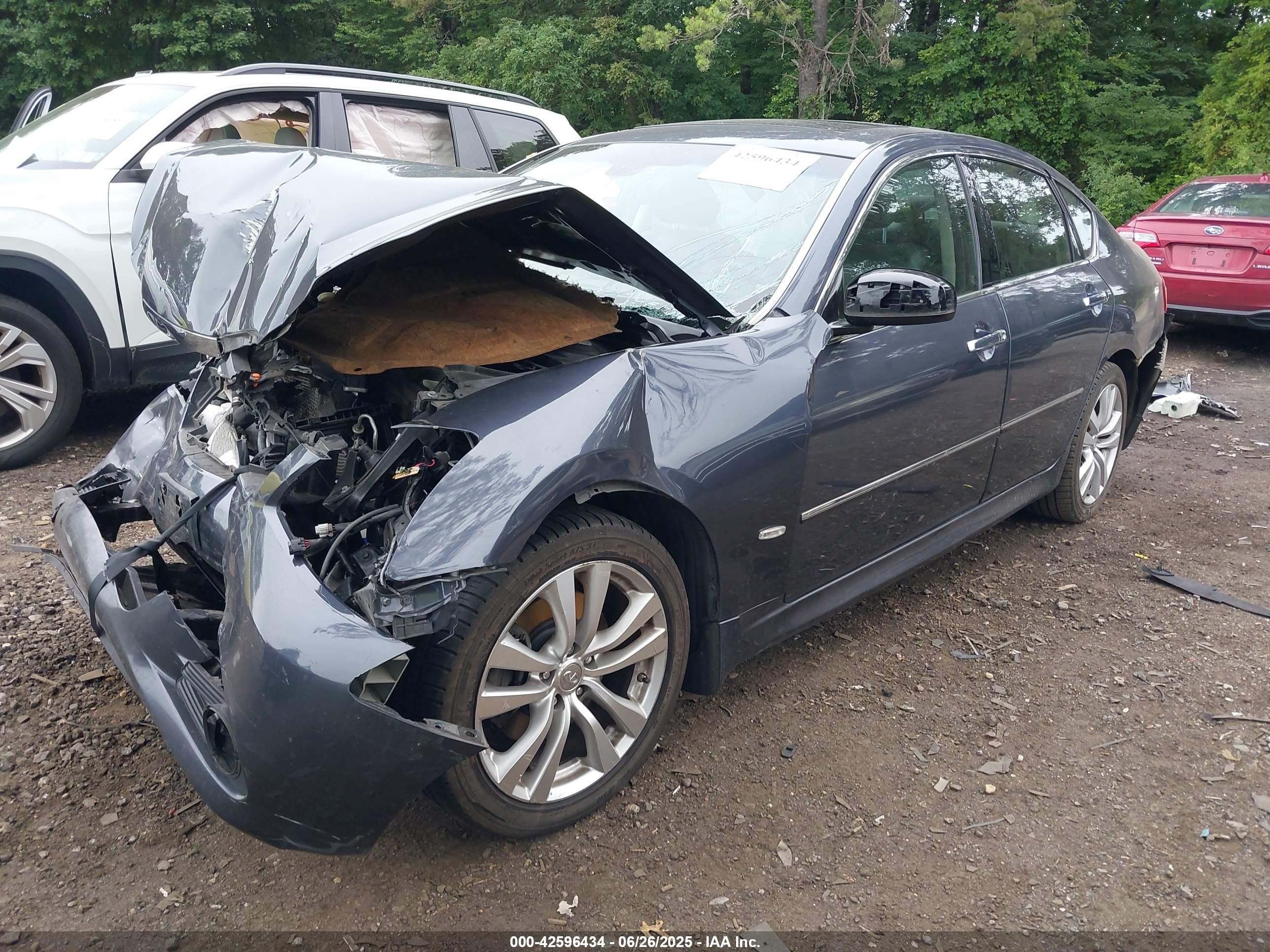 2010 Infiniti M35x   Blue vin: JN1CY0AR0AM960824