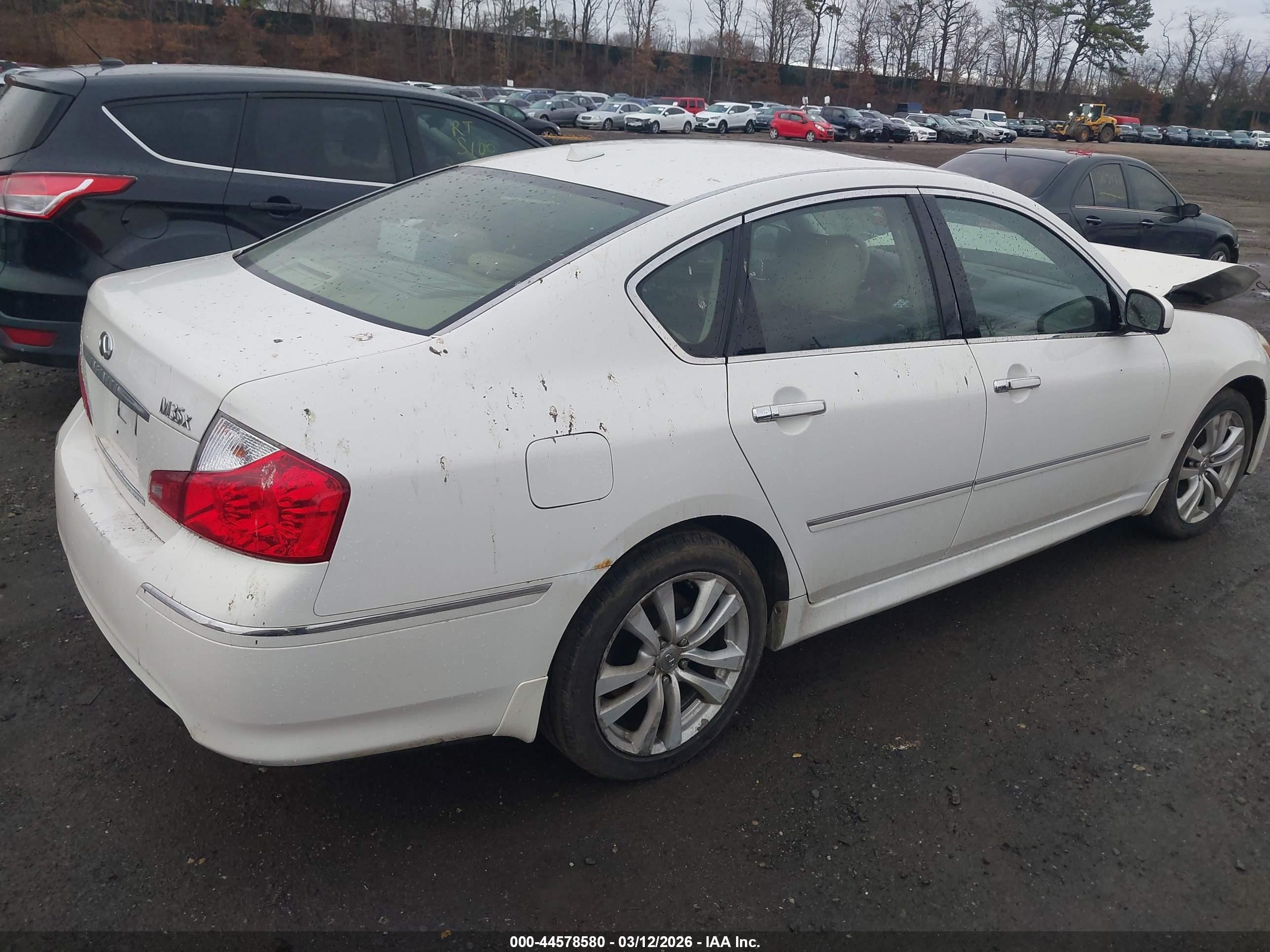 2010 Infiniti M35x   White vin: JN1CY0AR3AM960350