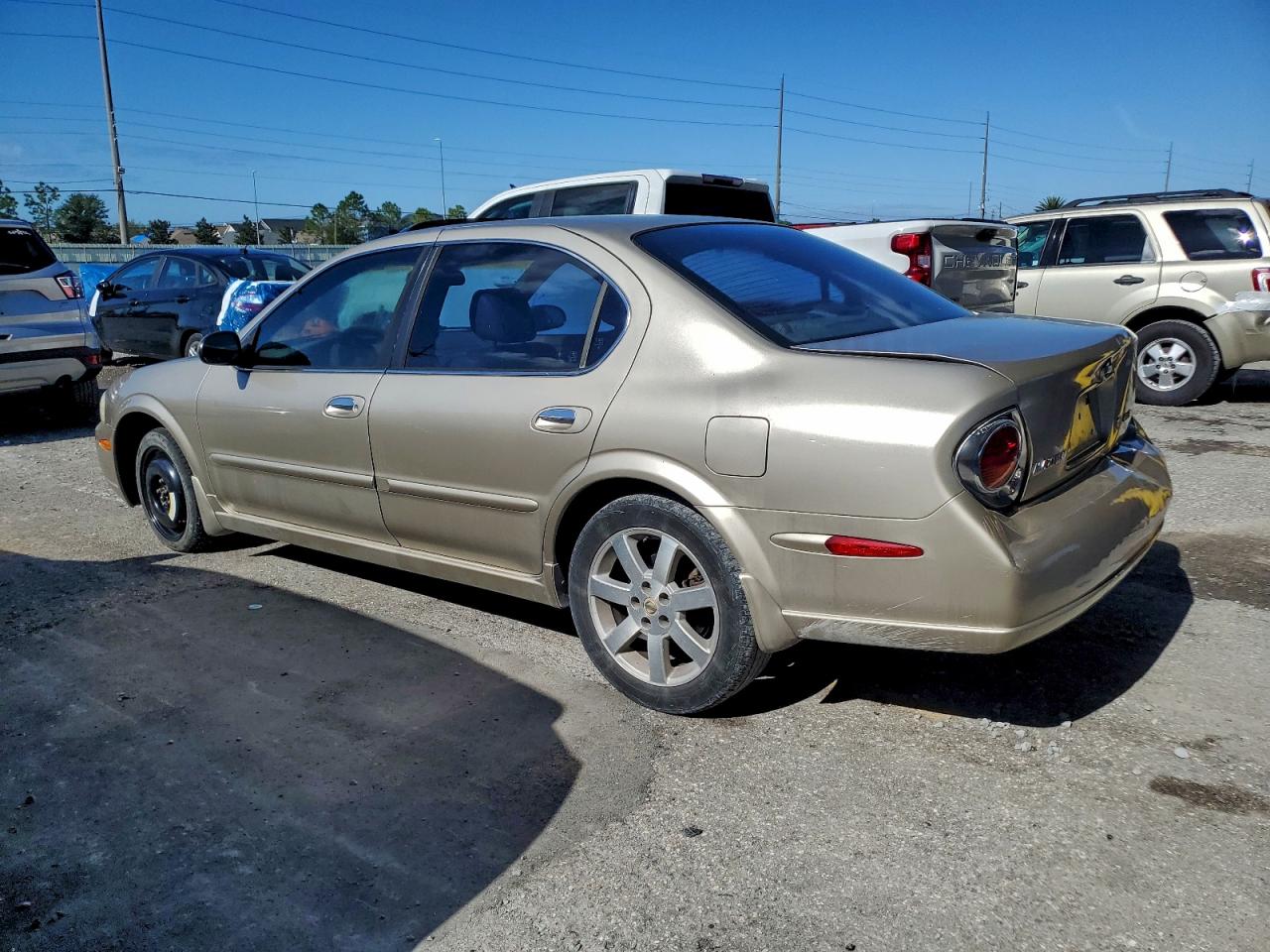 2003 Nissan Maxima Gle Tan vin: JN1DA31A03T435517