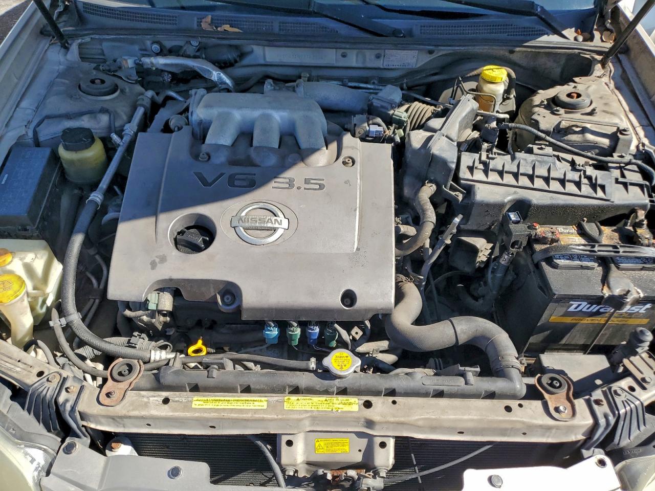2003 Nissan Maxima Gle Tan vin: JN1DA31A03T435517