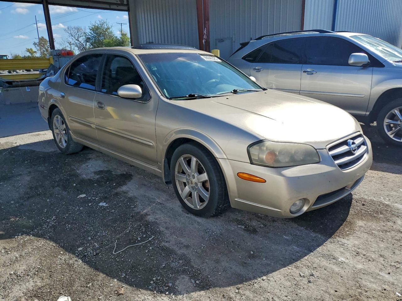 2003 Nissan Maxima Gle Tan vin: JN1DA31A03T435517