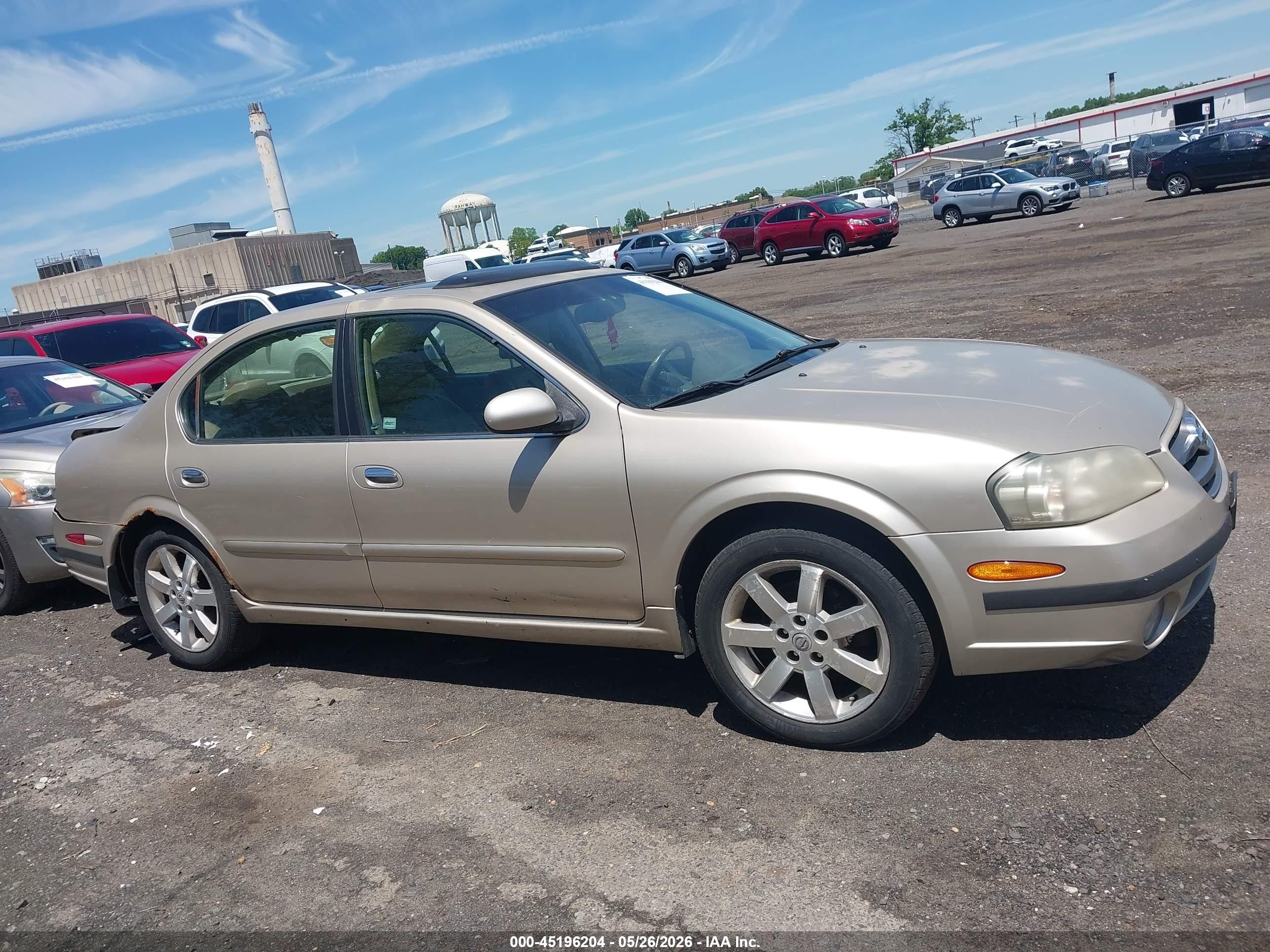 2002 Nissan Maxima Gle Gold vin: JN1DA31A22T318102