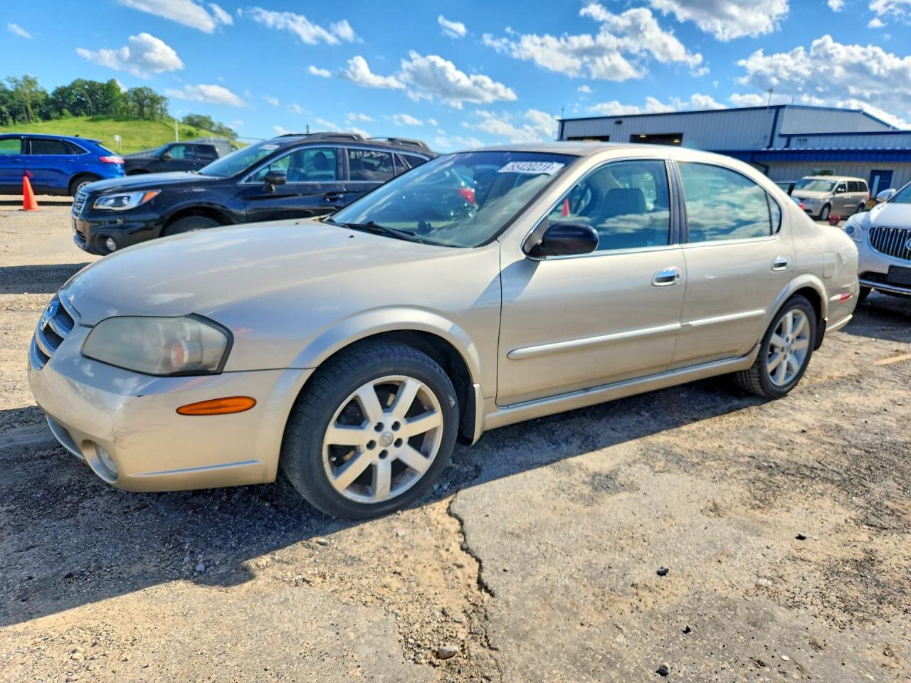 2003 Nissan Maxima Gxe Tan vin: JN1DA31A63T431813