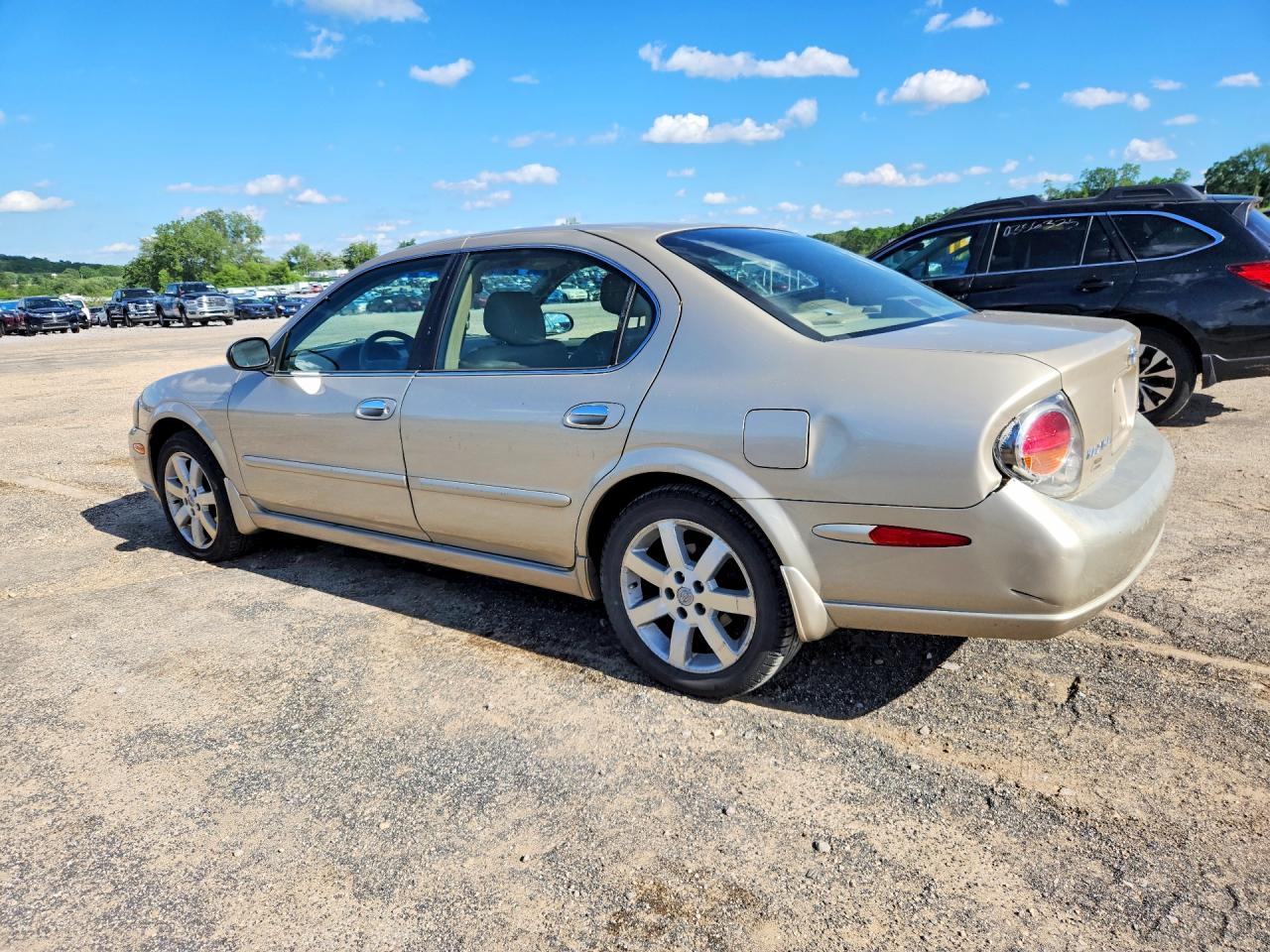 2003 Nissan Maxima Gxe Tan vin: JN1DA31A63T431813