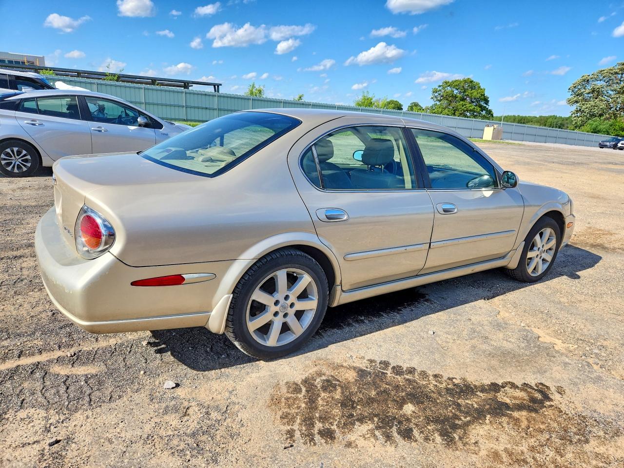 2003 Nissan Maxima Gxe Tan vin: JN1DA31A63T431813