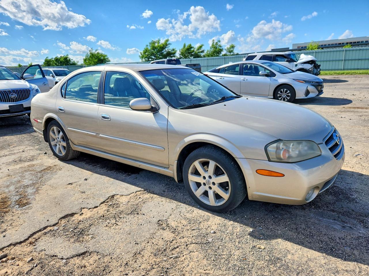 2003 Nissan Maxima Gxe Tan vin: JN1DA31A63T431813