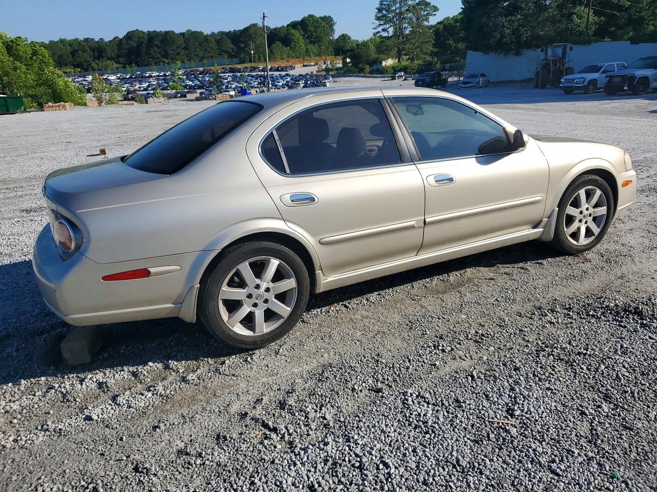 2003 Nissan Maxima Gxe Gold vin: JN1DA31A63T436462