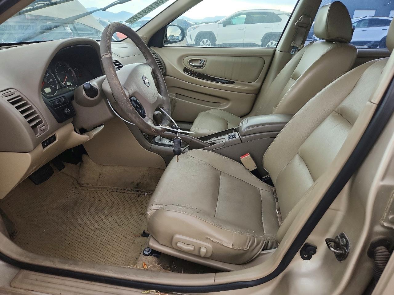 2003 Nissan Maxima Gxe Gold vin: JN1DA31A83T439721
