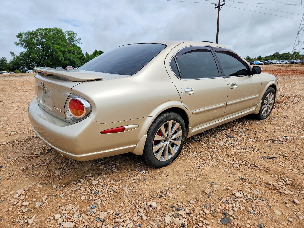 2002 Nissan Maxima Gxe Gold vin: JN1DA31AX2T323290