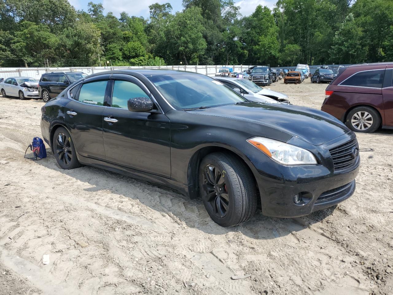 2012 Infiniti M35h    Black vin: JN1EY1APXCM910402