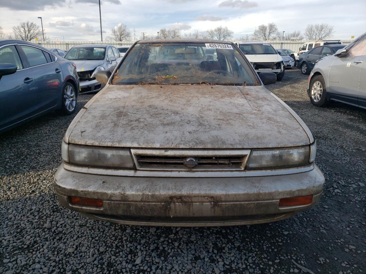 1990 Nissan Stanza  Gold vin: JN1FU21P7LT245289