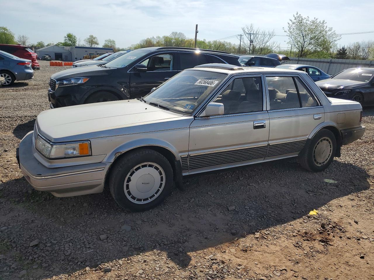 1987 Niss Maxima Silver vin: JN1HU11P2HT334892