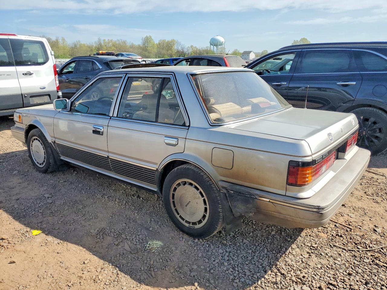 1987 Niss Maxima Silver vin: JN1HU11P2HT334892
