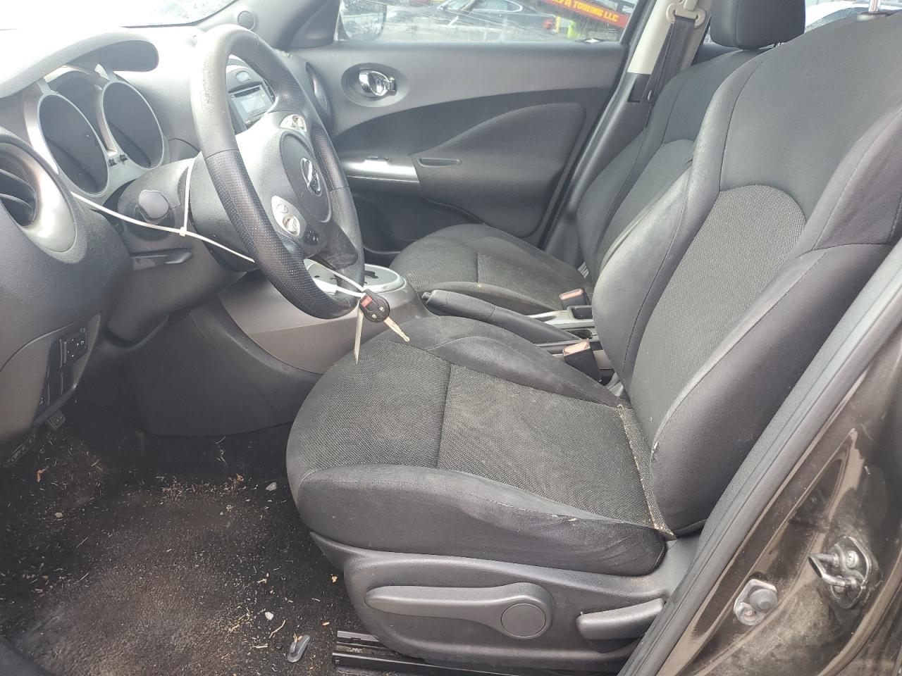 2013 Nissan Juke S Black vin: JN8AF5MR0DT218344 Damage: Steering Wheel, Worn, Replacement Required