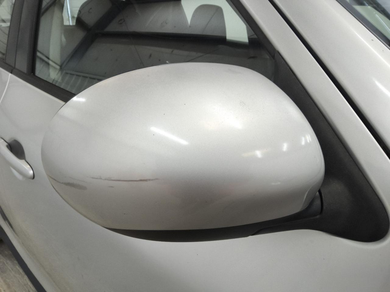 2014 Nissan Juke S Silver vin: JN8AF5MR8ET353959 Damage: Right Front Mirror Housing, Multiple Scratches Heavy, 3
