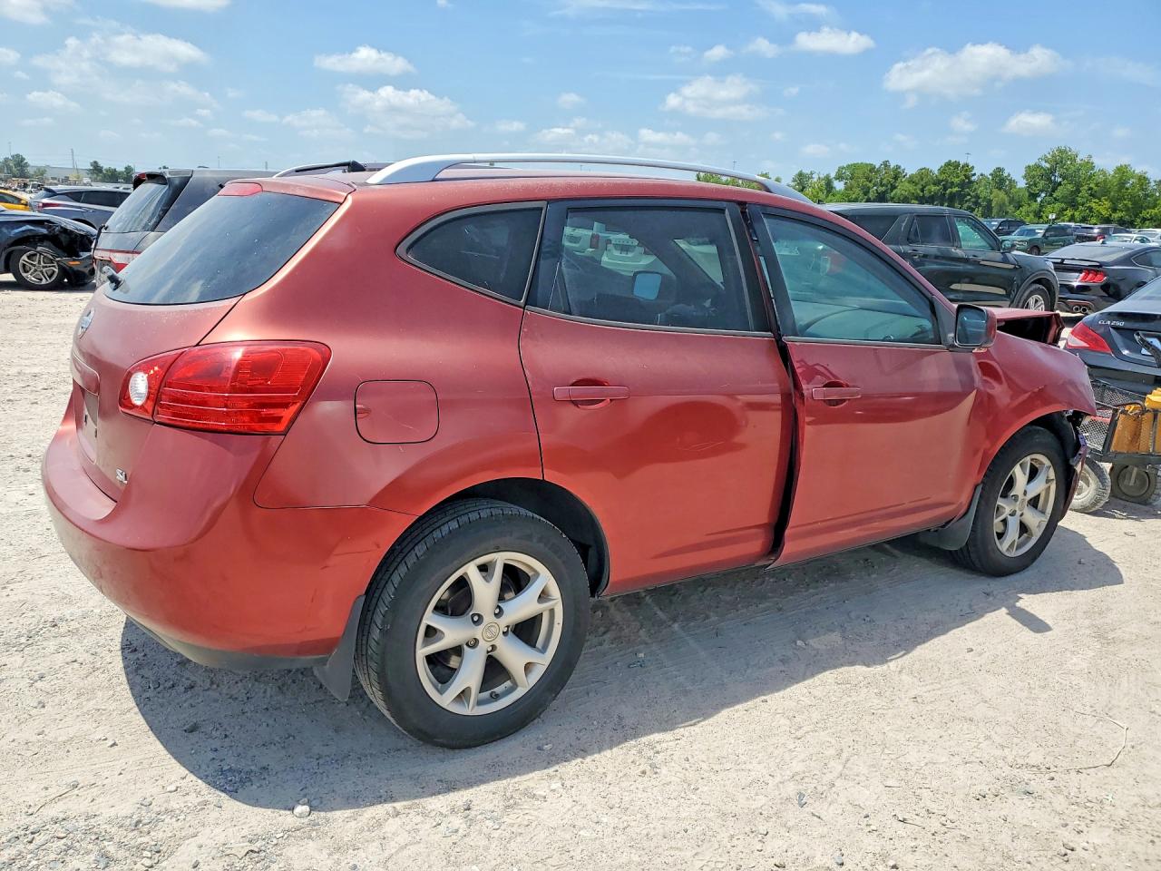 2009 Nissan Rogue S Red vin: JN8AS58T59W046416