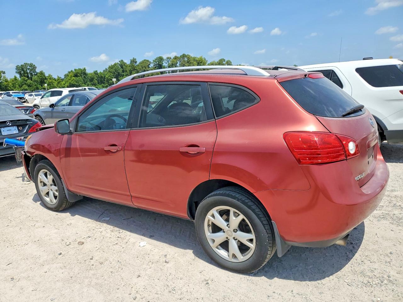 2009 Nissan Rogue S Red vin: JN8AS58T59W046416