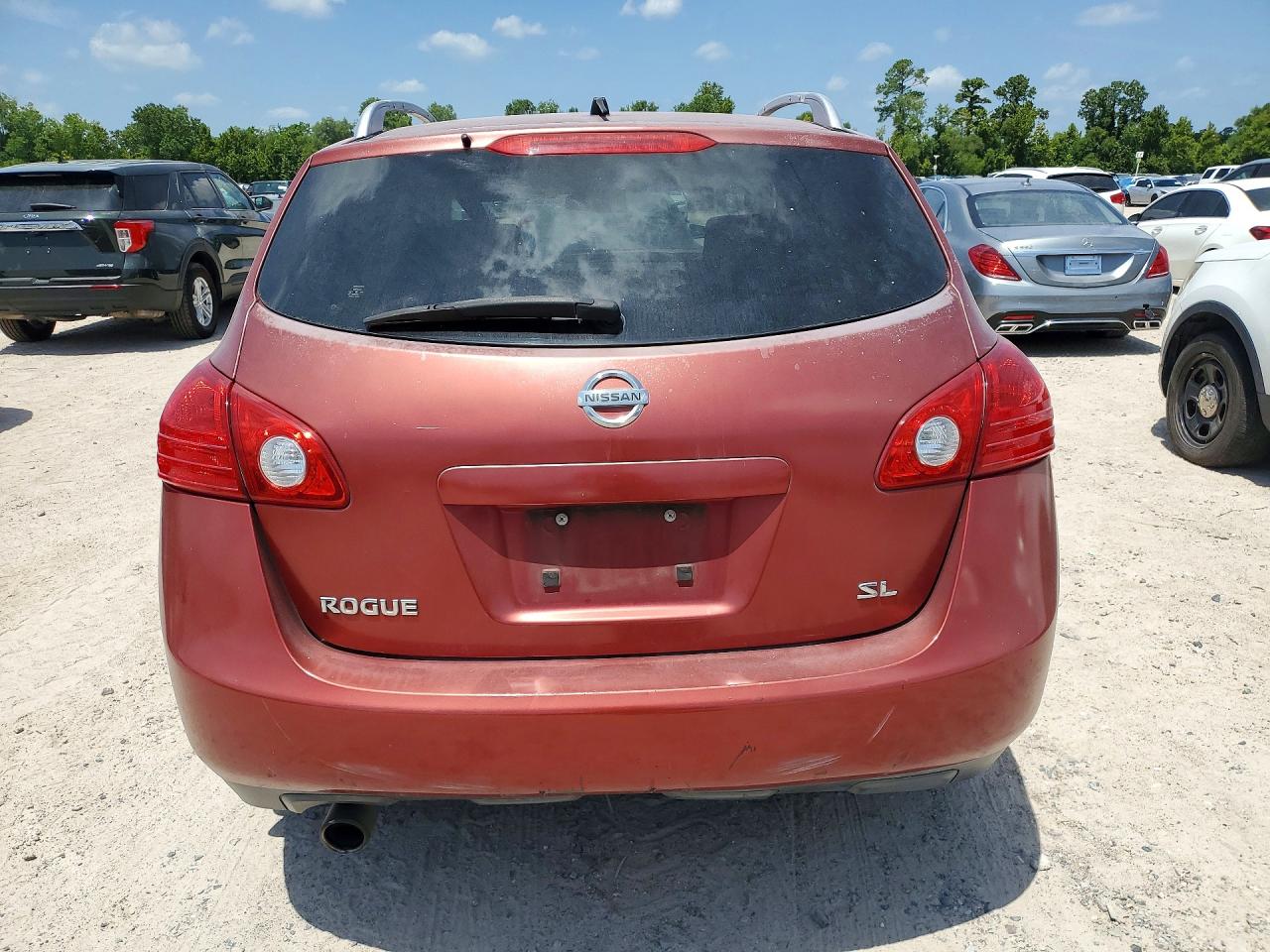2009 Nissan Rogue S Red vin: JN8AS58T59W046416