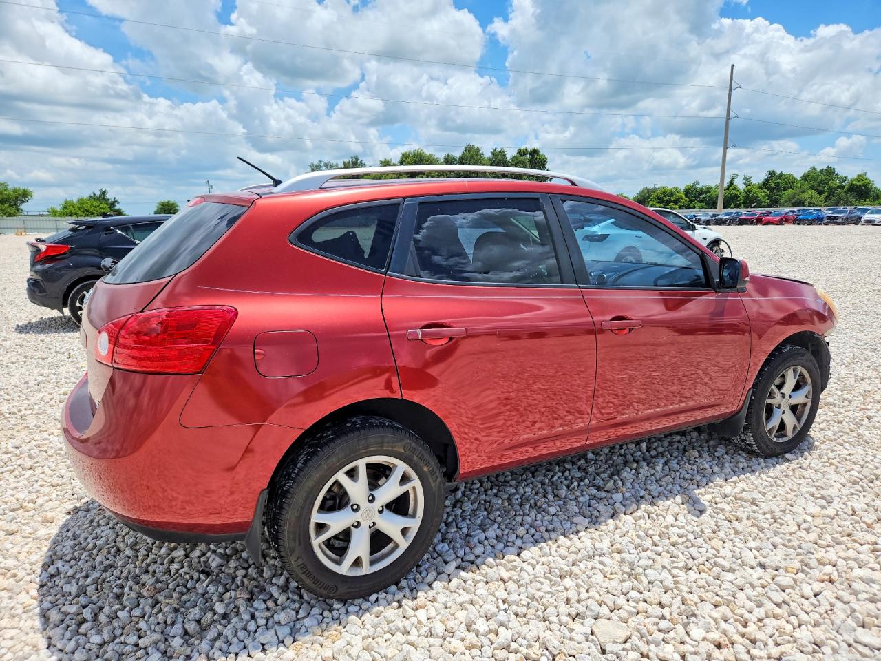 2009 Nissan Rogue S Red vin: JN8AS58T79W048183