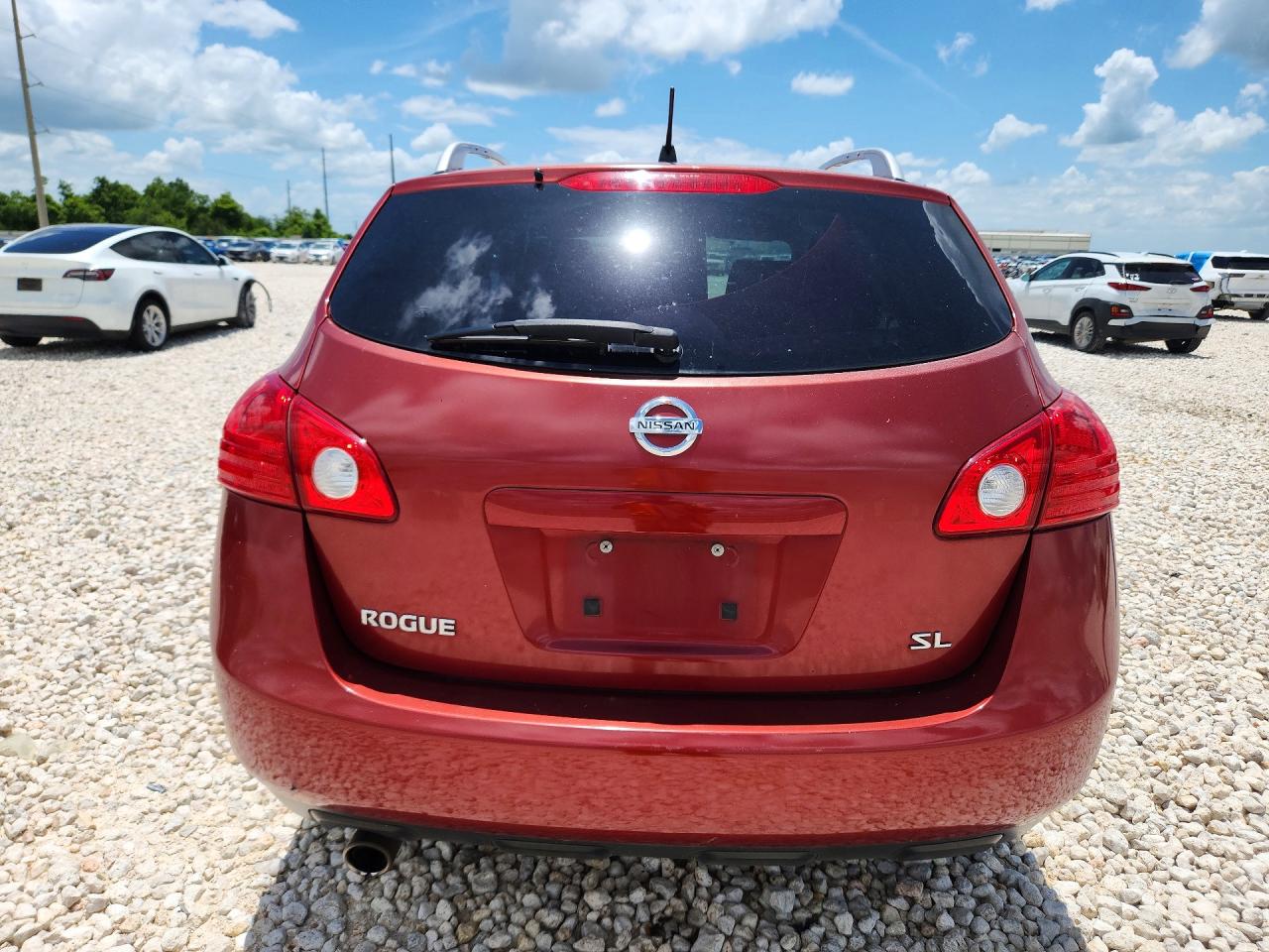 2009 Nissan Rogue S Red vin: JN8AS58T79W048183