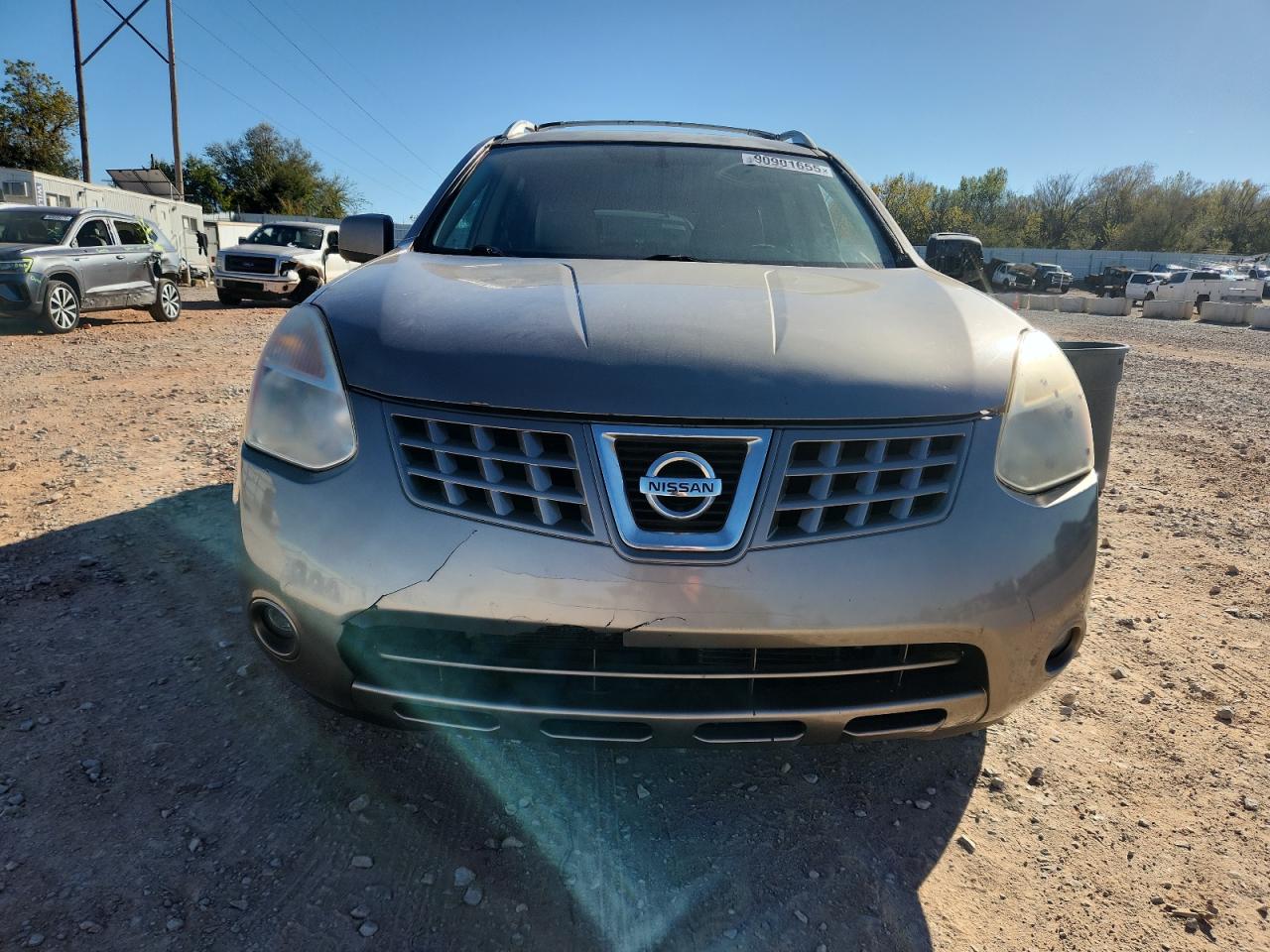 2009 Nissan Rogue S Tan vin: JN8AS58V09W161460