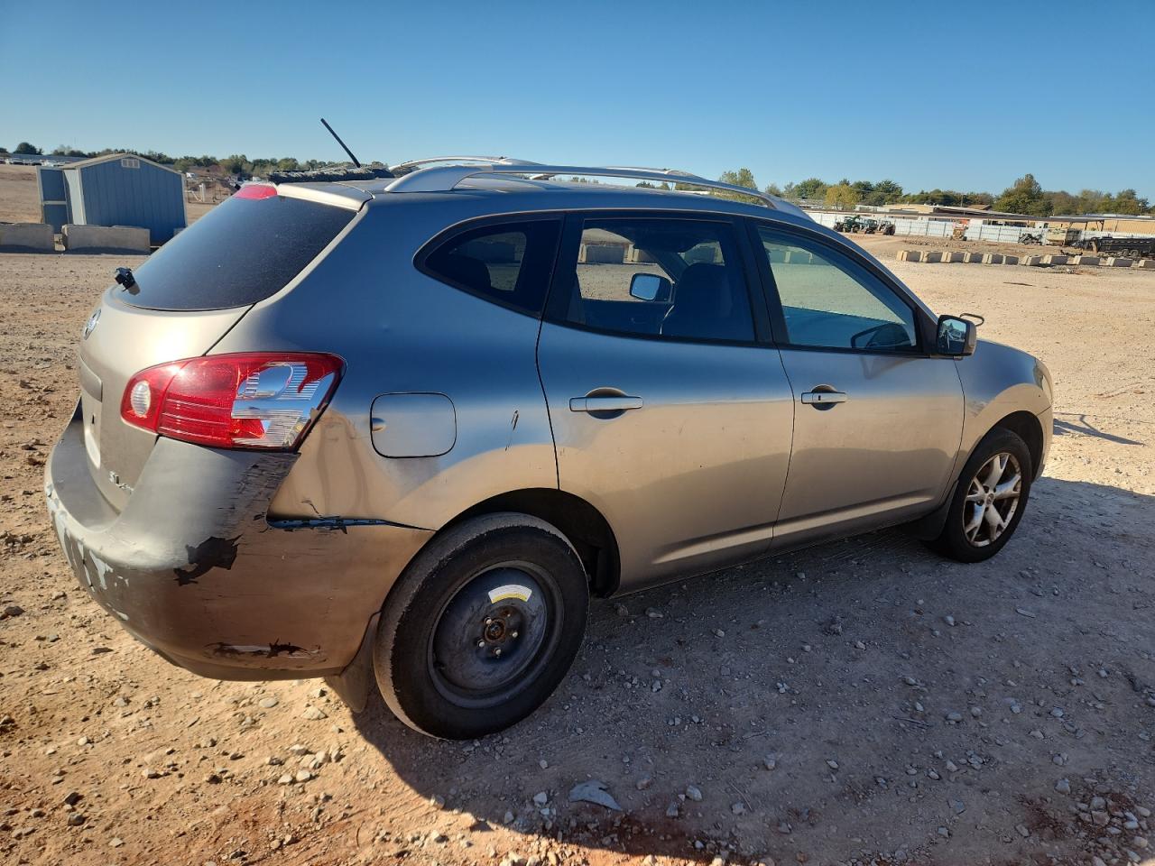 2009 Nissan Rogue S Tan vin: JN8AS58V09W161460