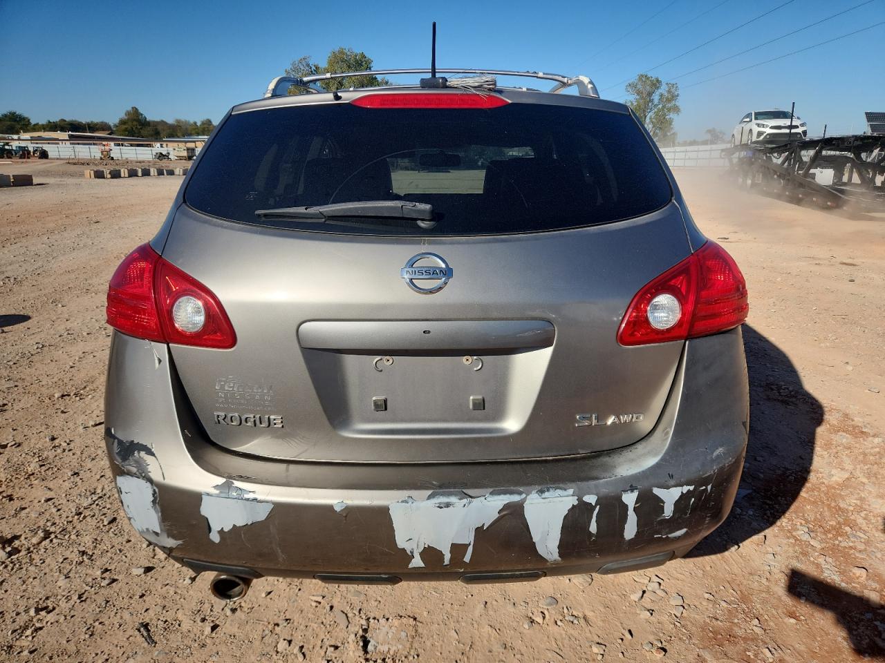 2009 Nissan Rogue S Tan vin: JN8AS58V09W161460