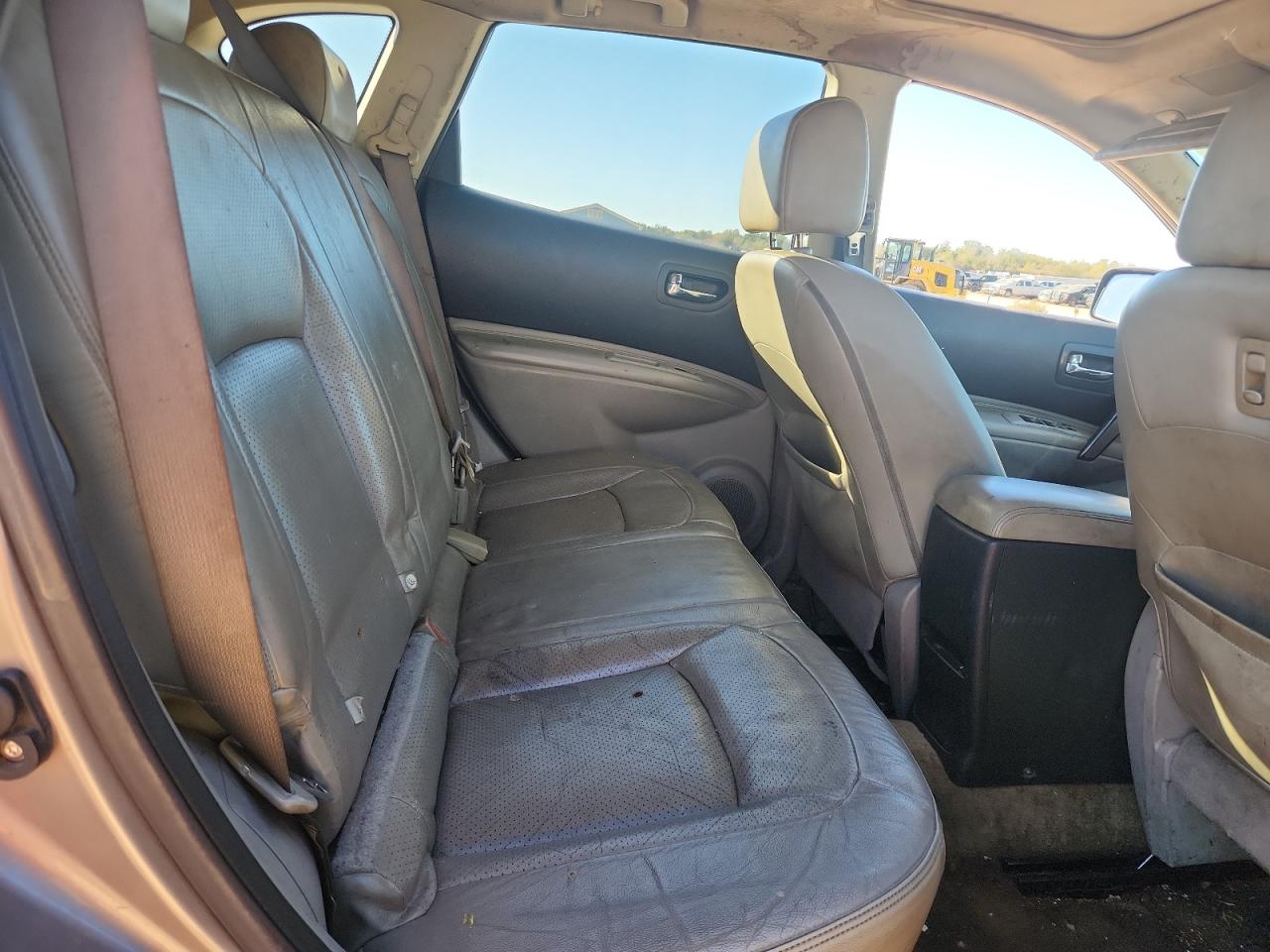 2009 Nissan Rogue S Tan vin: JN8AS58V09W161460