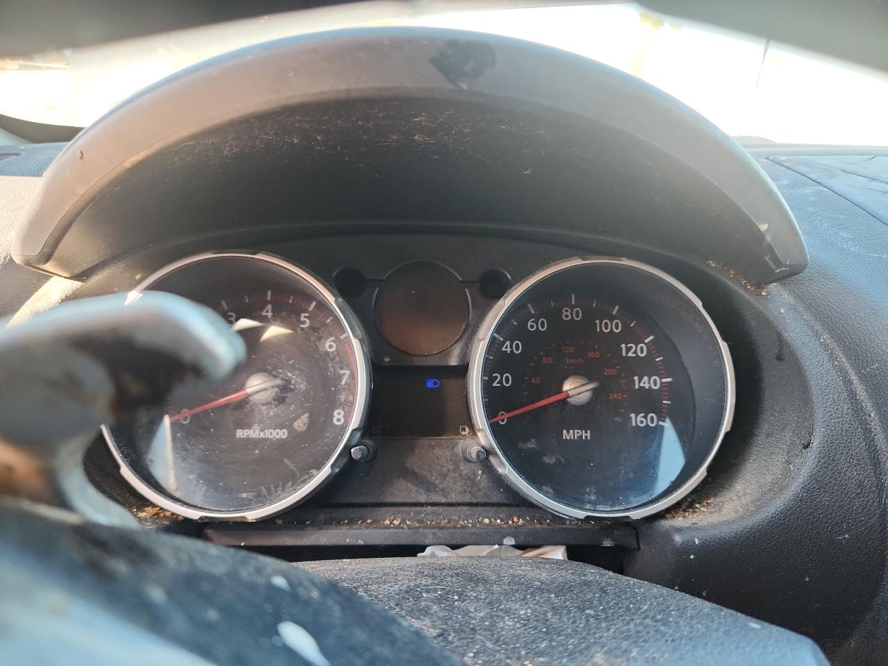 2009 Nissan Rogue S Tan vin: JN8AS58V09W161460