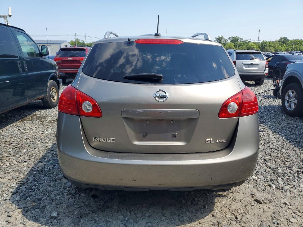 2009 Nissan Rogue S Tan vin: JN8AS58V19W442909