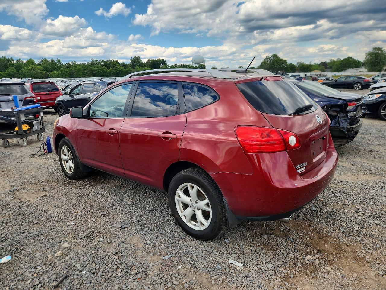2009 Nissan Rogue S Red vin: JN8AS58V79W175677