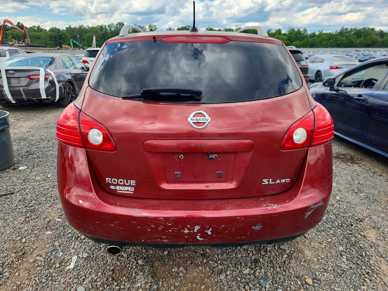 2009 Nissan Rogue S Red vin: JN8AS58V79W175677