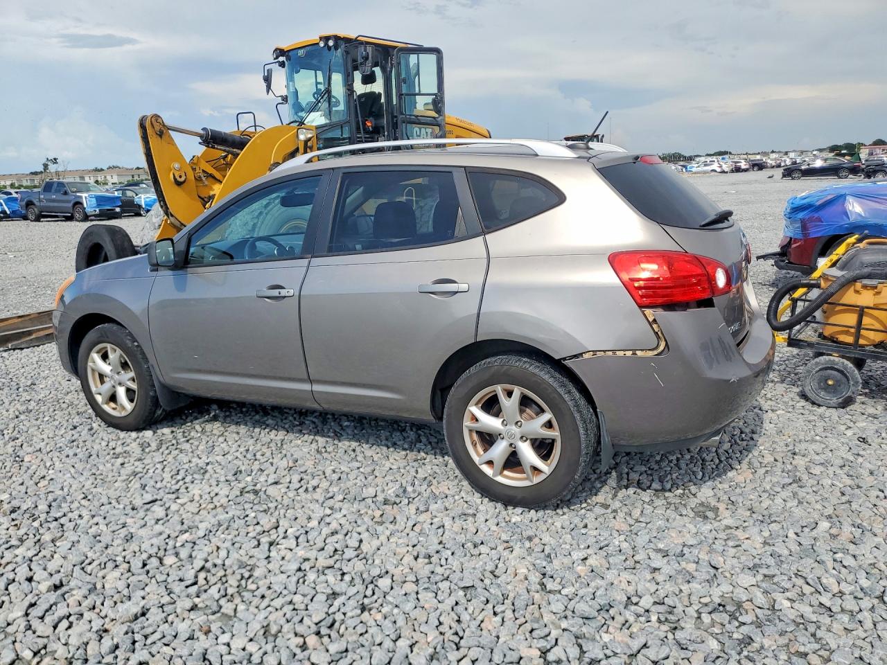 2009 Nissan Rogue S Tan vin: JN8AS58V99W164129
