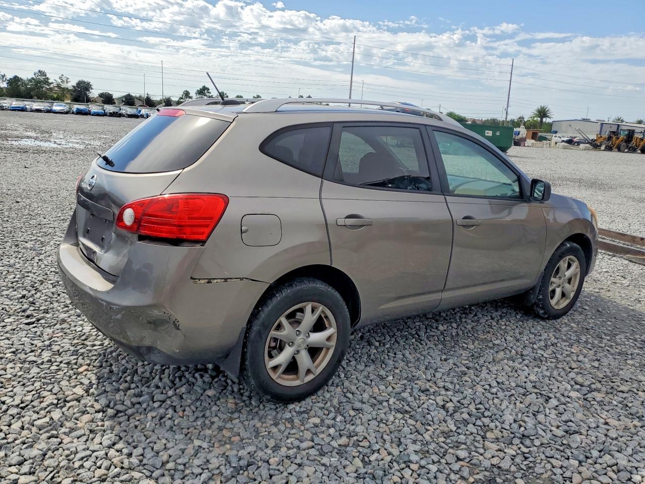 2009 Nissan Rogue S Tan vin: JN8AS58V99W164129
