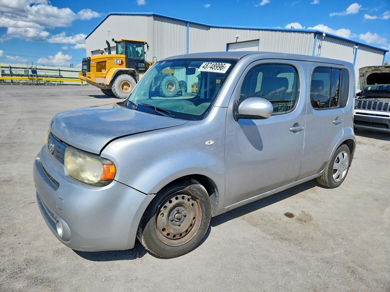 2009 Nissan Cube 1.8 Серебряный vin: JN8AZ28R09T130899