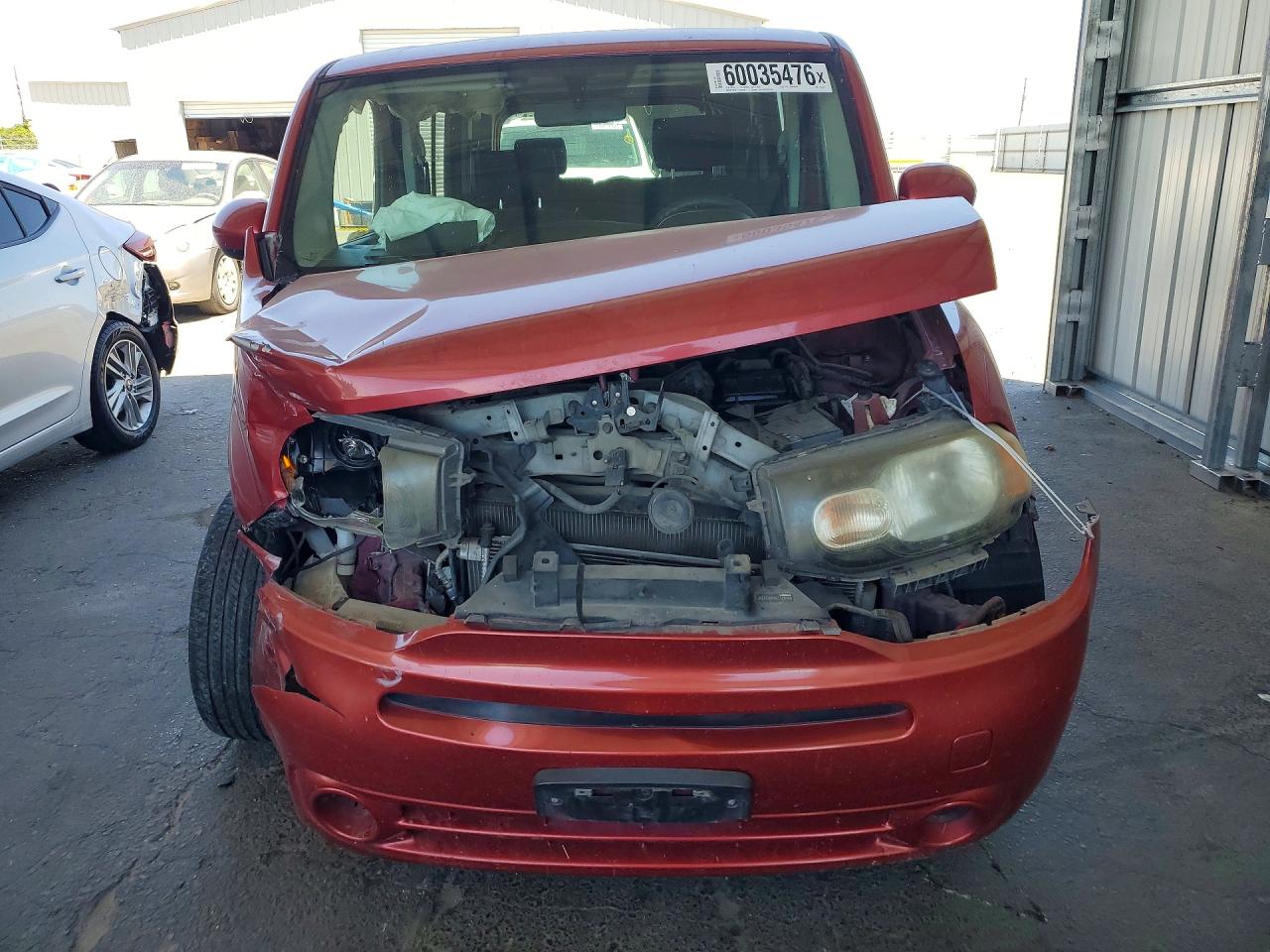 2009 Nissan Cube 1.8 Red vin: JN8AZ28R99T125149