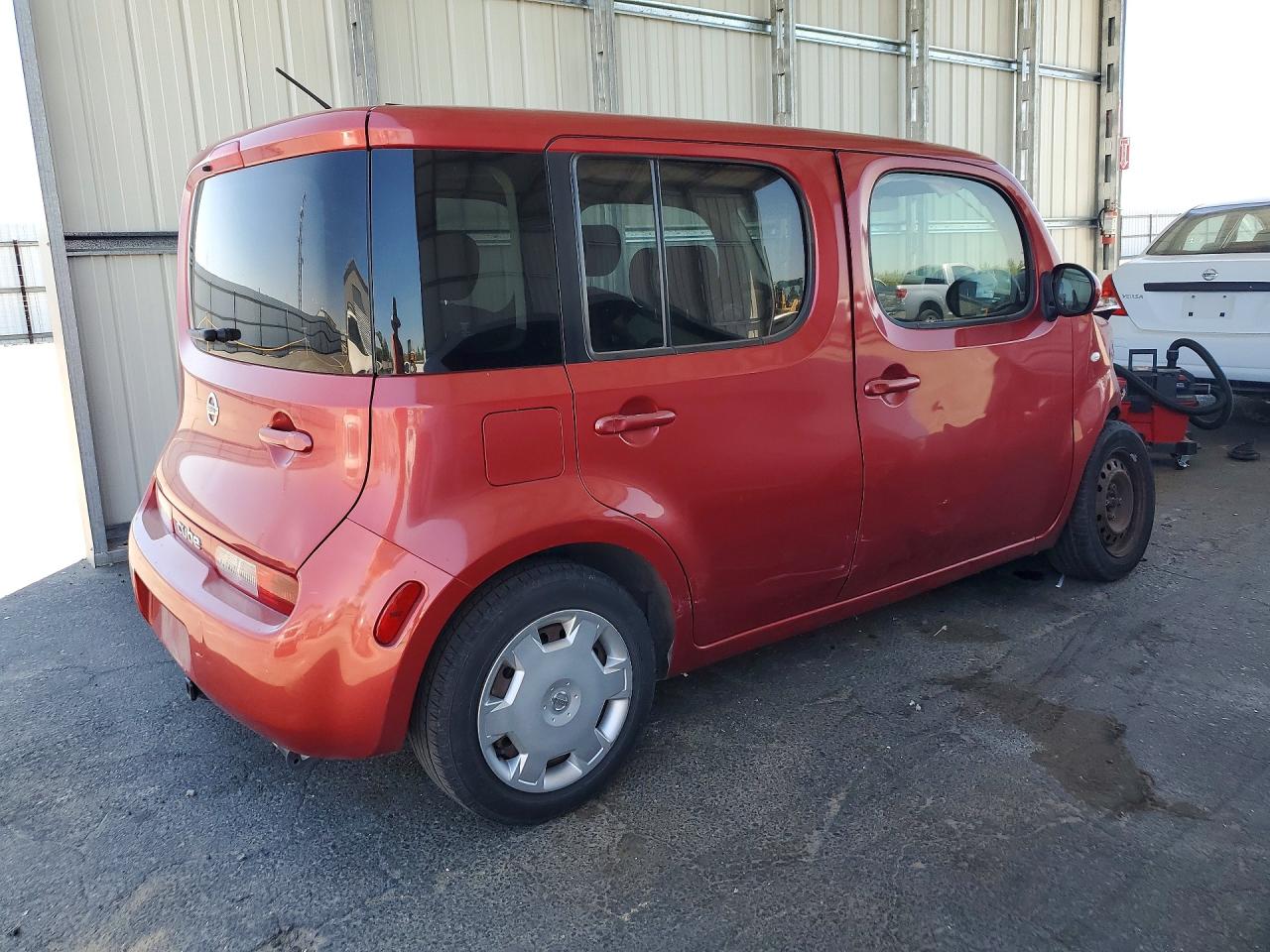 2009 Nissan Cube 1.8 Red vin: JN8AZ28R99T125149